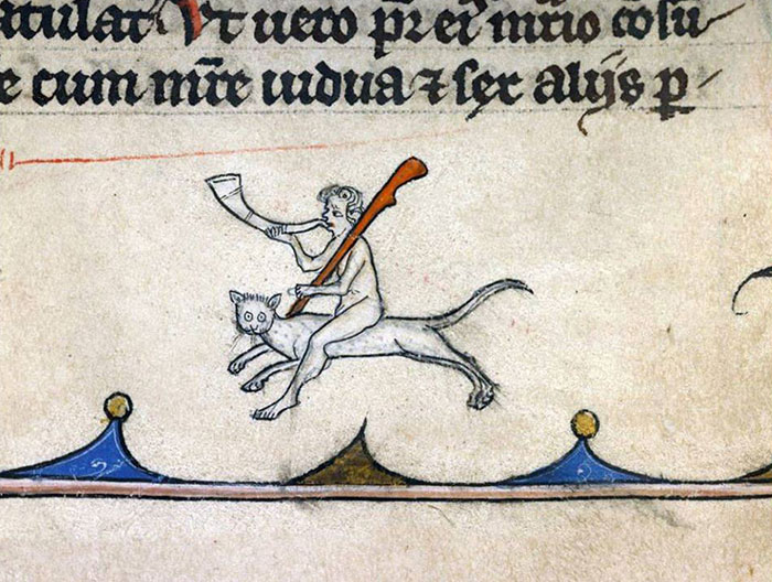 Medieval art with a man riding an awkward-looking cat, highlighting the humorous depiction in ancient paintings.