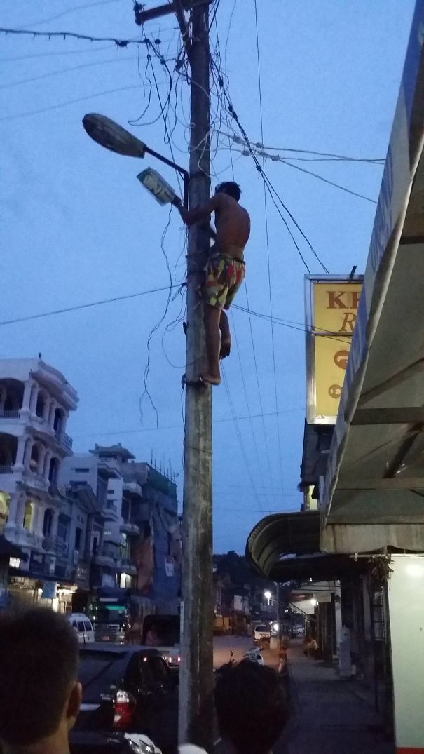 Had A Beer With This Guy Before I Watched Him Scale And Live Wire The Light In... Should I Buy Him A Beer Before He Heads To The Next One Just Incase It's His Last Beer?