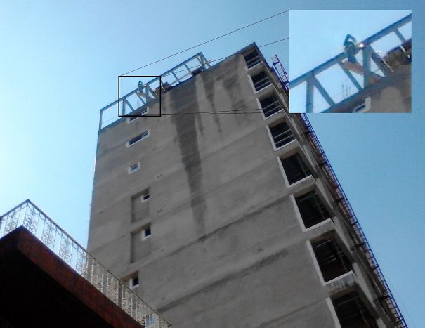 Welding 11 Stories Up While Standing On A Piece Of Wood Extended Off The Edge Of Building (Quito Ecuador)