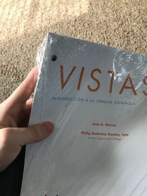 $275 Required Spanish Textbook Is Loose Leaf Paper Wrapped In Cellophane