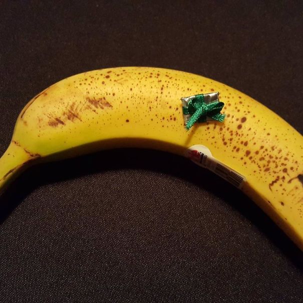 My Kid Has An Unhealthy Obsession With Who Got The "Biggest" Present. Gift Wrapped 32 GB Micro SD Card. Banana For Scale