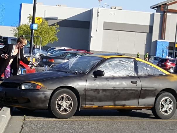 This Woman Was Spray-Painting Her Car Black In A Walmart Parking Lot On A Windy Day