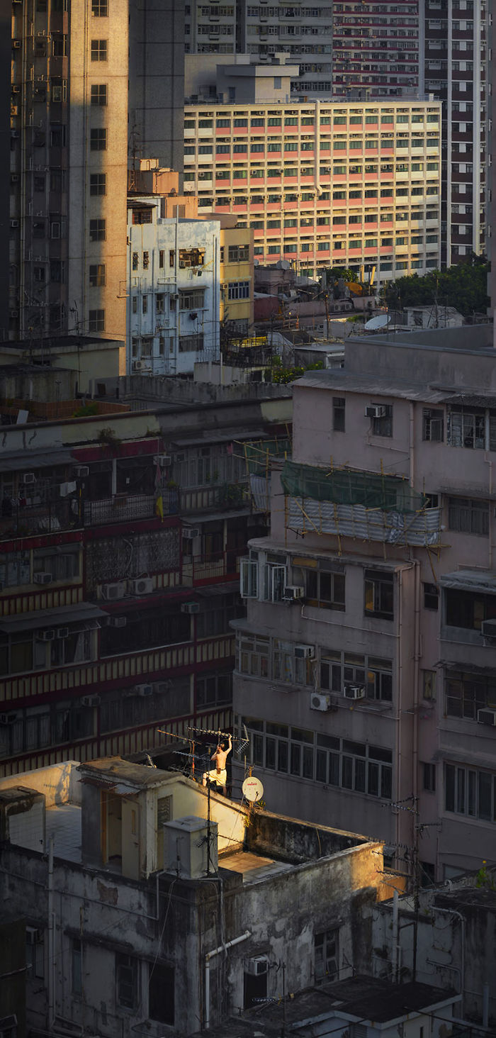 "Morning Fix," A Man Is Fixing Up The Rooftop's Antenna At Dawn