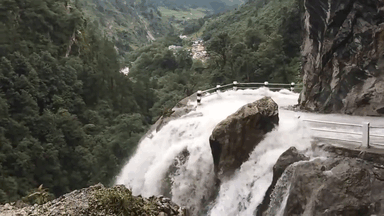 Driver Skillfully Navigates One Of The World's Most Dangerous Roads In Nepal That Runs Through A Waterfall Driver Skillfully Navigates One Of The World's Most Dangerous Roads In Nepal That Runs Through A Waterfall