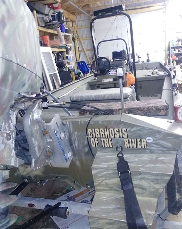 Funny names boat in a garage 