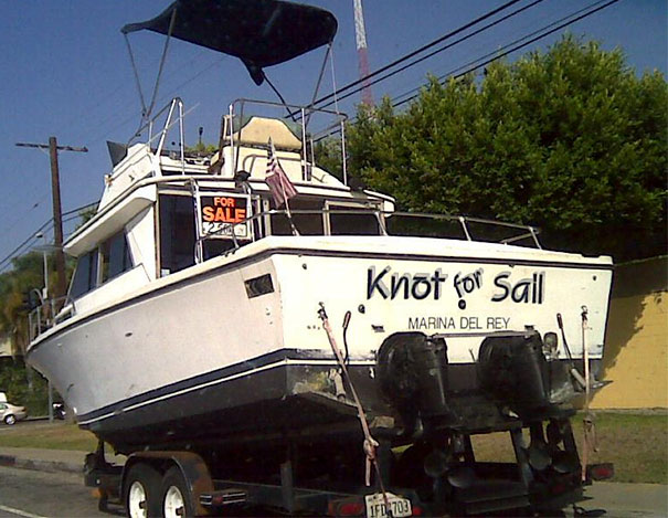 Funny named white boat for sale 
