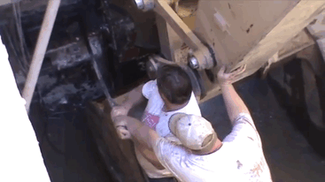 How To Open A Blast Door At The Bottom Of A Pit With 250 Tons Of Water Behind It Using Only Two Guys, A Bar And An Excavator