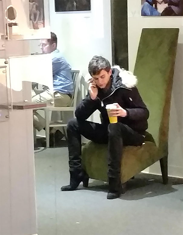 Due To The Chair Leg And This Guy's Posture, It Looks Like He's Wearing High Heels