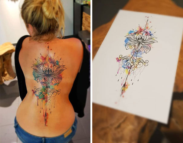 Watercolor lotus spine tattoo on woman's back with design sketch on paper.