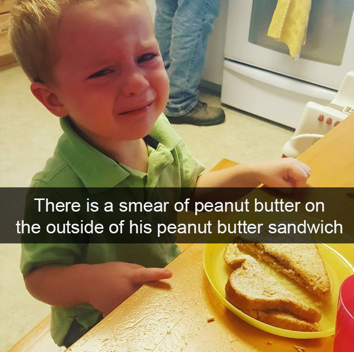 There Is A Smear Of Peanut Butter On The Outside Of His Peanut Butter Sandwich