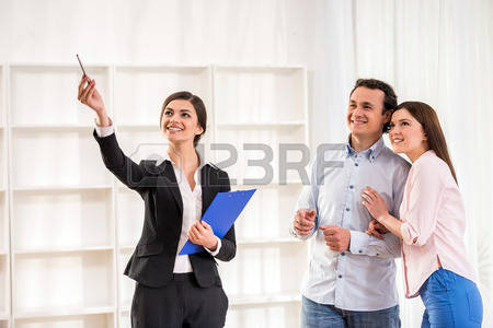 39393778-female-realtor-is-showing-a-flat-to-young-couple-5b018a6d67138.jpg