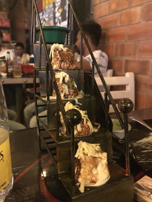 I Ordered Some Cheese Filled Cottage Cheese. It Came On Miniature Stairs. With The Dip On Top