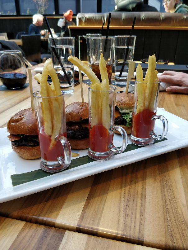 Fries Sitting In Ketchup In Shot Glasses, Getting Soggy