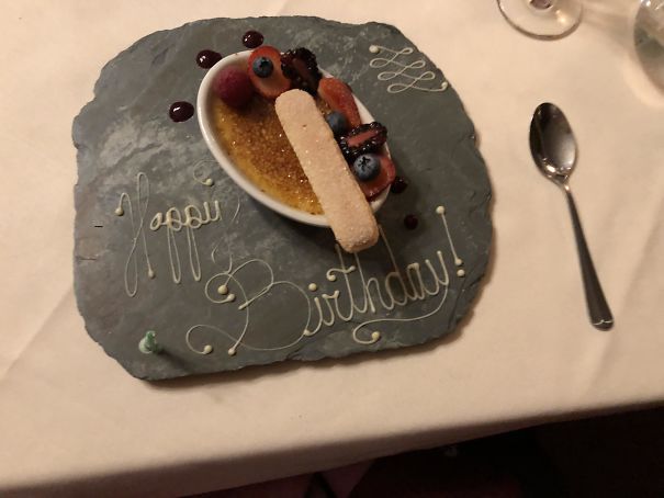 My Boyfriend Got His Creme Brûlée On A Porous Tile Plate With A Message. We Thought It Was Edible, But Nope! It Was Glue