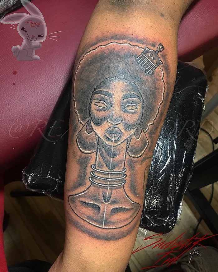 Tattoo showcases artist's skill in understanding a client's wish from a funny sketch.
