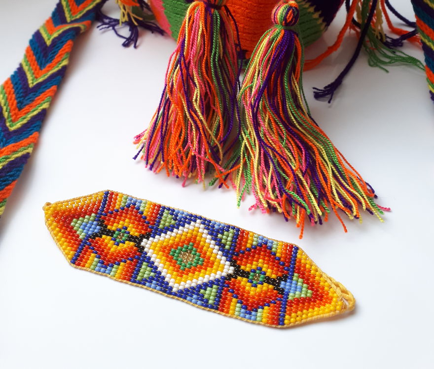 I Make Bracelets From Colorful Beads With A Pattern Of Indians Of Latin America