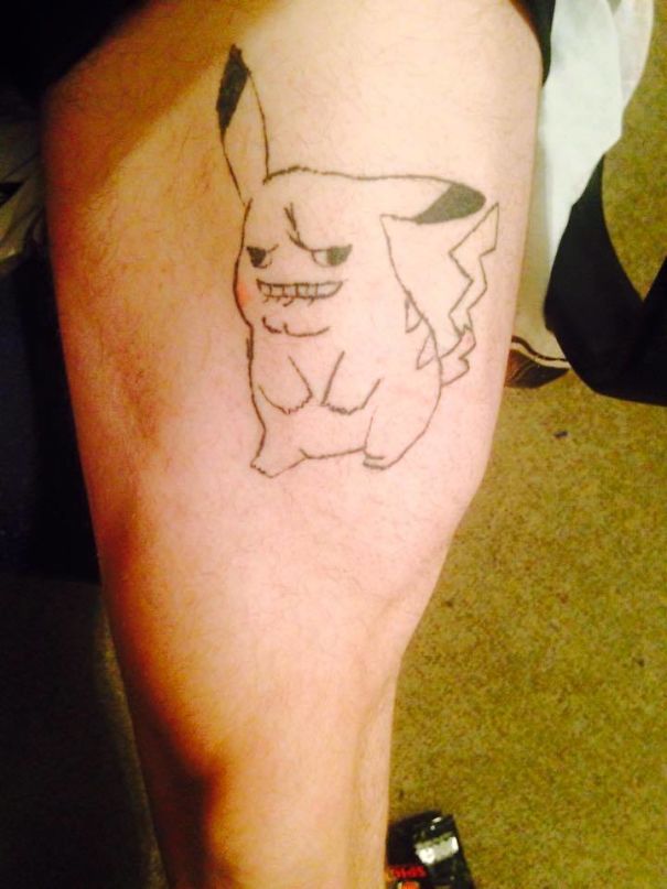 Bad tattoo fail featuring a rough sketch of a Pikachu character on a person's thigh.
