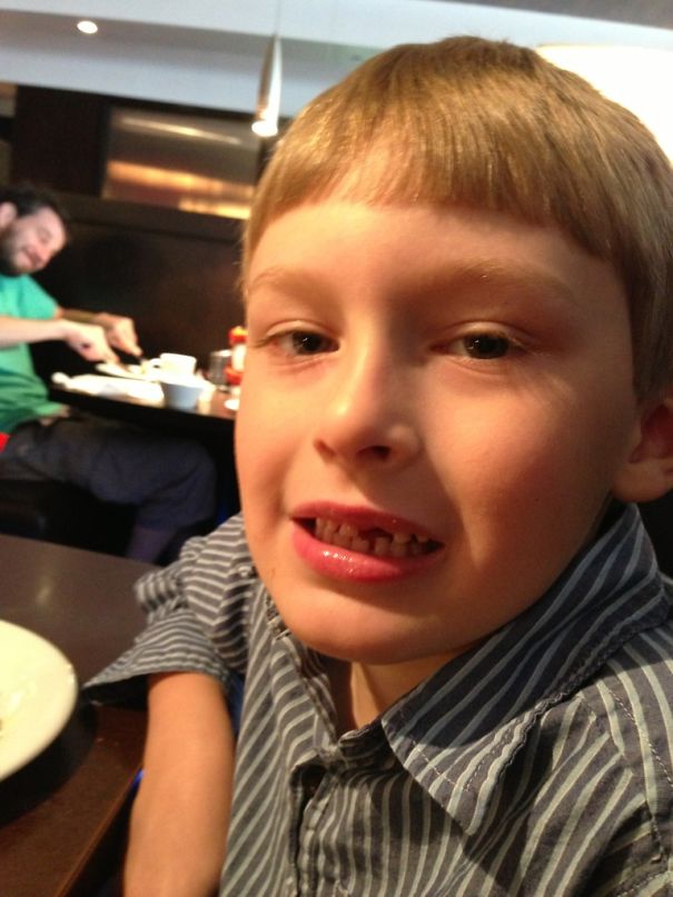Took This Picture Of My Kid While At A Restaurant, I Can't Stop Laughing At The Guy In The Back