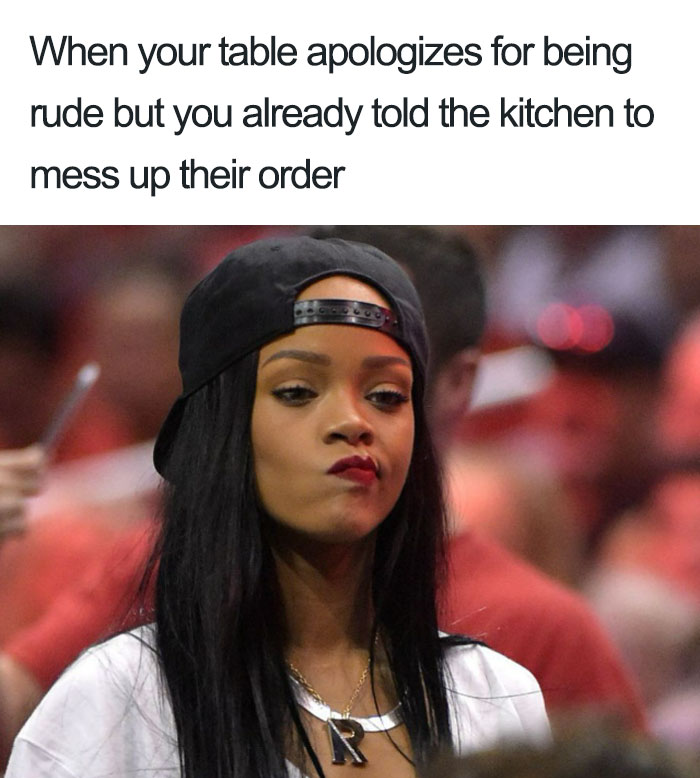 Woman wearing cap with text about restaurant meme, looking unimpressed.