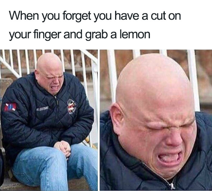 Bald man wincing in pain, wearing a dark jacket, reacting to grabbing a lemon with a cut finger. Hilarious restaurant meme.