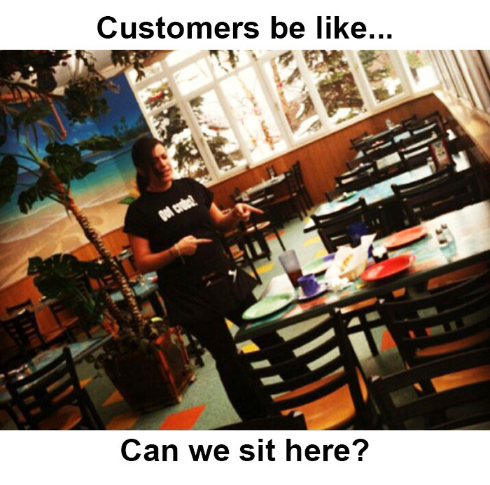 Waitress in an empty restaurant gesturing towards a table, with text about funny restaurant memes.