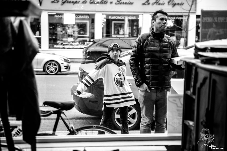 On Monday, April 30th 2018 At 7:47pm, A Young Boy Was Frantically Swinging His Body From Left To Right While Looking At His Own Reflexion In The Window Of The Postage, Vins Nature & Restaurant, Whose Menu Was Being Thoroughly Read By His Father