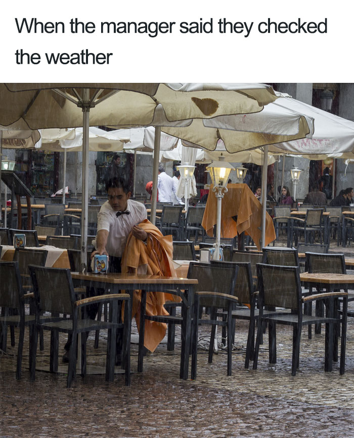 Waiter struggles in rainy restaurant; a humorous take on restaurant work challenges.