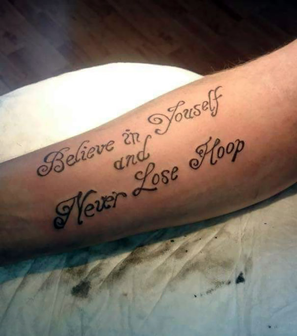 Tattoo fail with misspelled phrase "Believe in Youself and Never Lose Hoop" on arm.