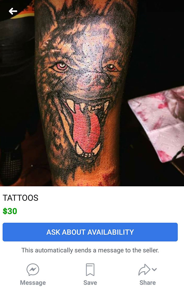 A poorly executed tattoo of a snarling dog on an arm, showcasing a tattoo fail.