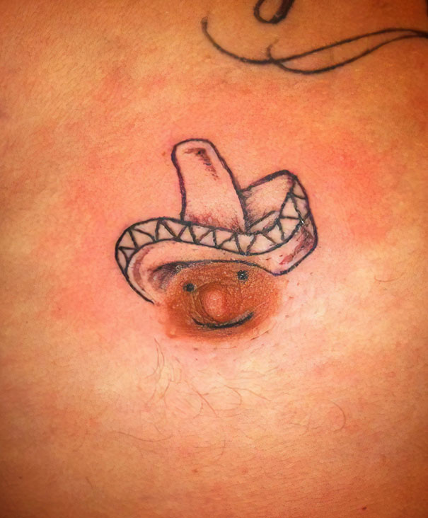 Funny bad tattoo fail with a hat design around a n****e.