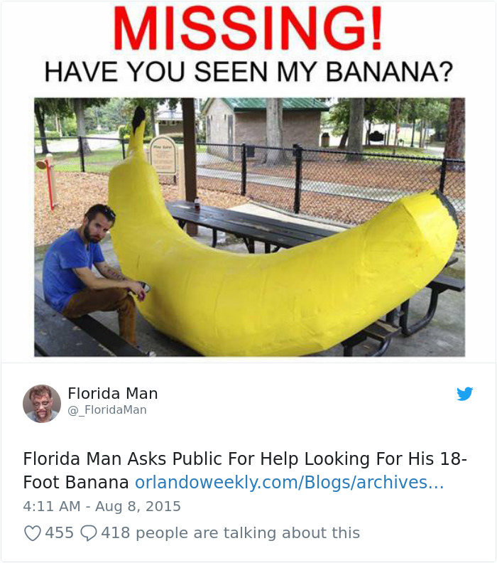 Florida man sitting beside a giant banana sculpture under a "Missing" sign at a park.