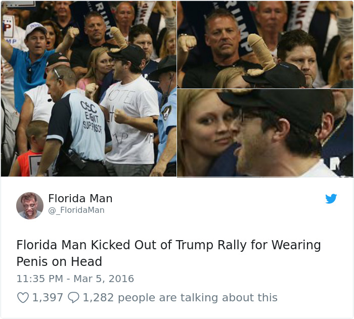 Florida man removed from rally for wearing unusual headgear, surrounded by a crowd and security personnel.