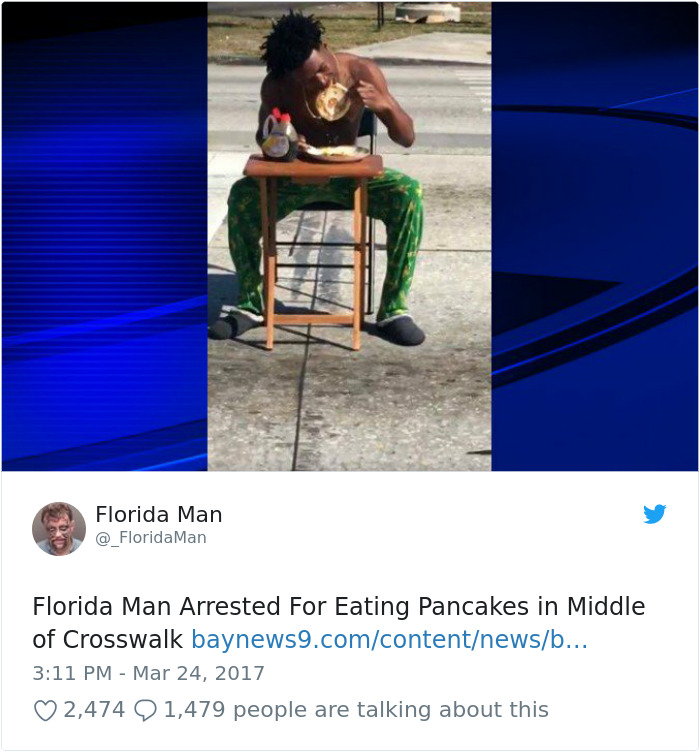 Florida man eating pancakes at a table in the middle of a crosswalk.