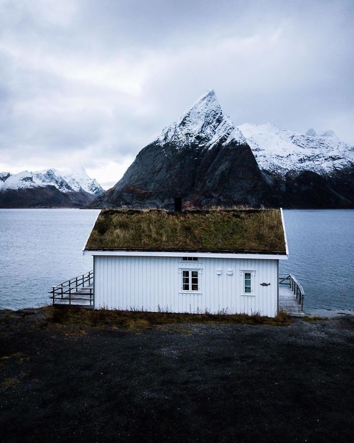 Architecture Of Norway. These Small Houses Named Rorbuer Have Been Adapted To Meet Norwegian Climatic Conditions, Including: Harsh Winters, High Winds And, In Coastal Areas, Salt Spray. They Even Carry Mountains