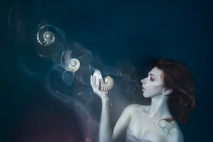 I Performed Underwater Holding Dissolving Shells To Convey The Effects Of Ocean Acidification