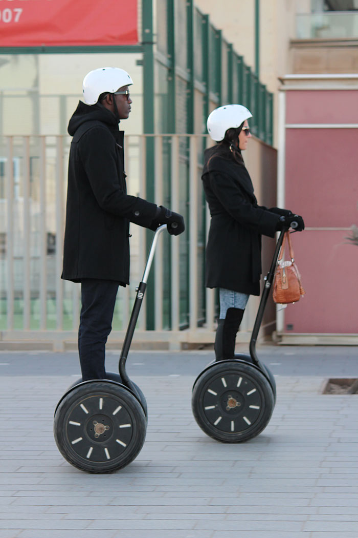 Person riding Segways