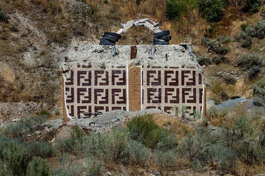 Street Artist Creates ‘Valley Of Secret Values’ By Transforming Crumbling Concrete Structures Into Designer Bags Street Artist Creates ‘Valley Of Secret Values’ By Transforming Crumbling Concrete Structures Into Designer Bags