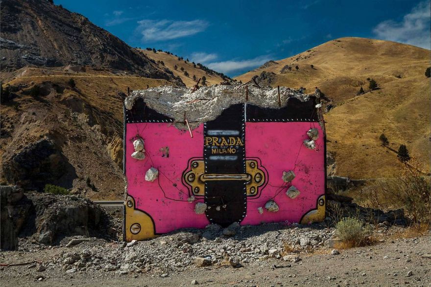 Street Artist Creates ‘Valley Of Secret Values’ By Transforming Crumbling Concrete Structures Into Designer Bags Street Artist Creates ‘Valley Of Secret Values’ By Transforming Crumbling Concrete Structures Into Designer Bags