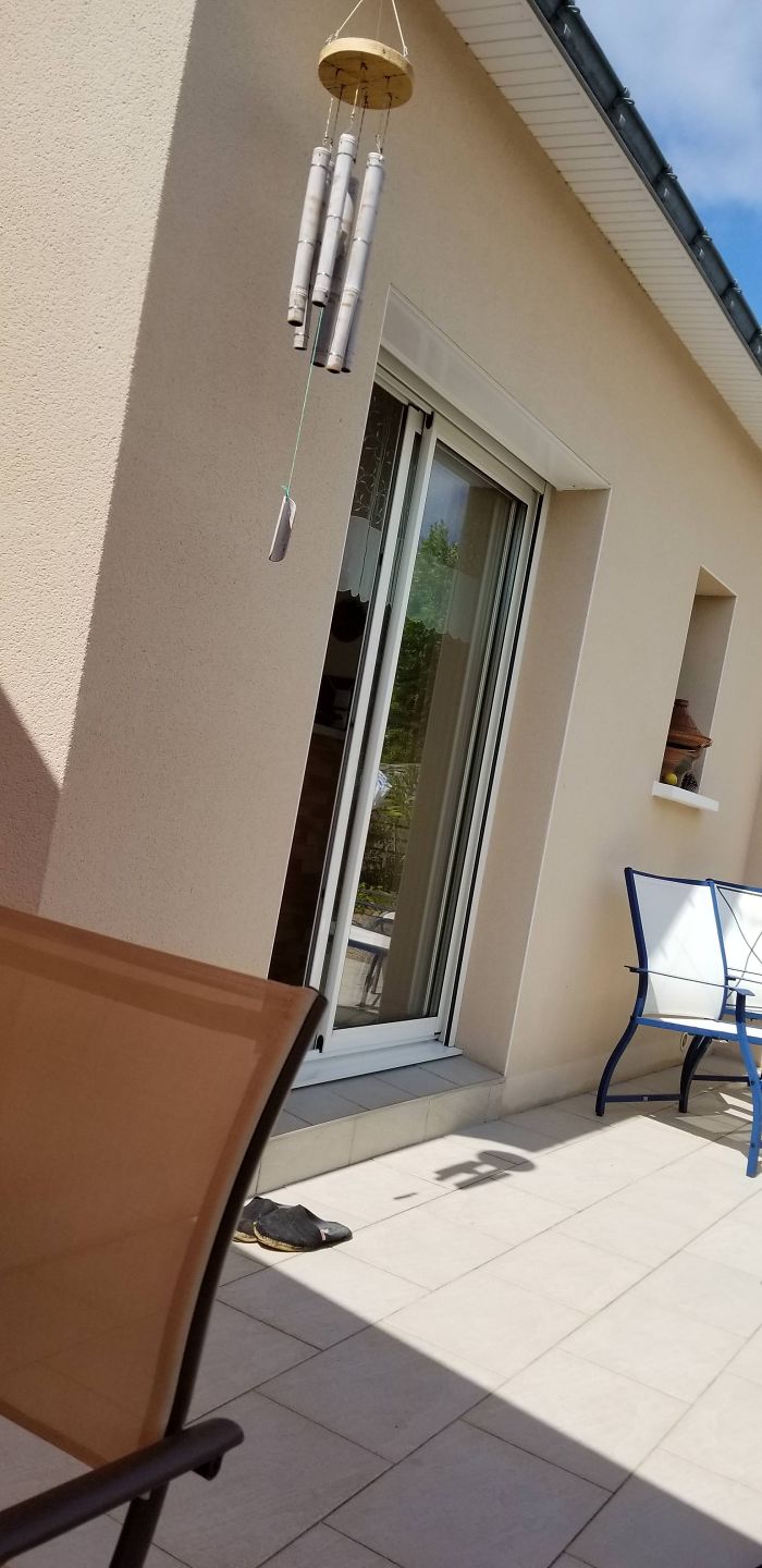 The Shadow Of This Wind Chime Looks Like The Starship Enterprise