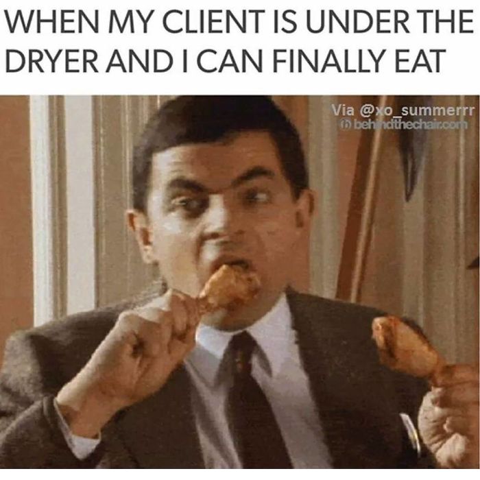 A person eating fried chicken with text above: "When my client is under the dryer and I can finally eat." Hilarious hairstylist meme.
