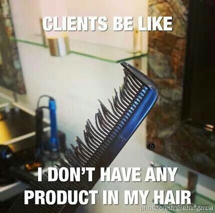 A comb clogged with hair products in a salon setting, humorously highlighting hairstylist challenges.