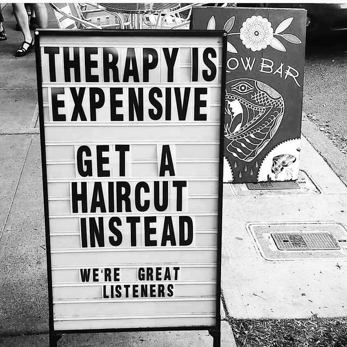 A humorous sign suggests getting a haircut as a cheaper alternative to therapy.
