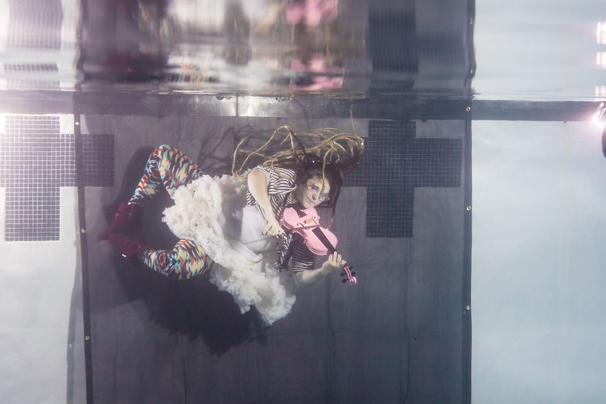 Photographer Creates Epic Band Shot By Taking The Group Underwater