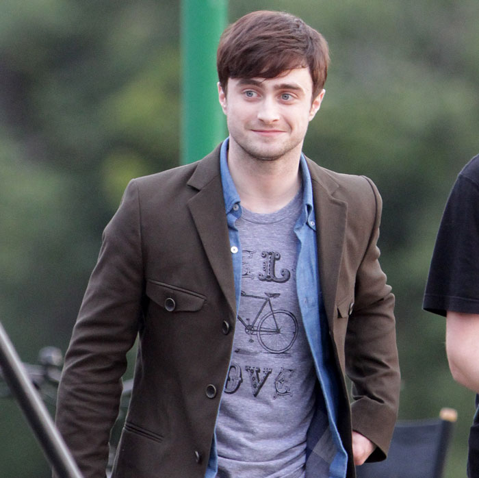Daniel Radcliffe walking and smiling