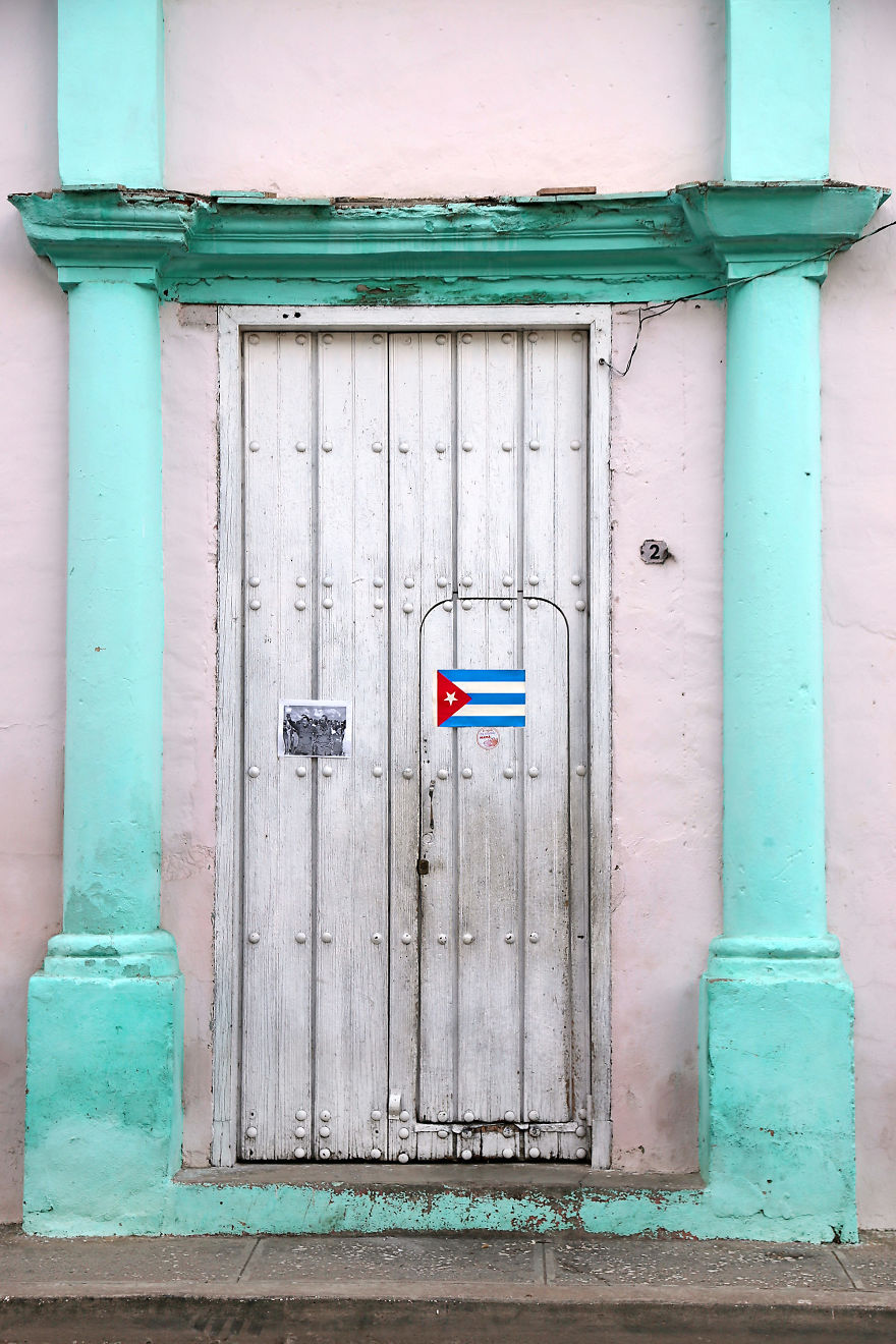 The Cuban National Flag Is Displayed On The Door Of A House In The City Of Bayamo, Cuba