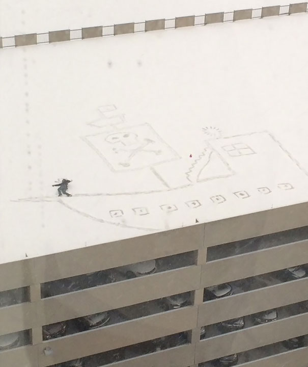 Guy Working On The 13th Floor Looked Out The Window At The Top Of The Parking Garage, And Had An Idea. This Is The Result