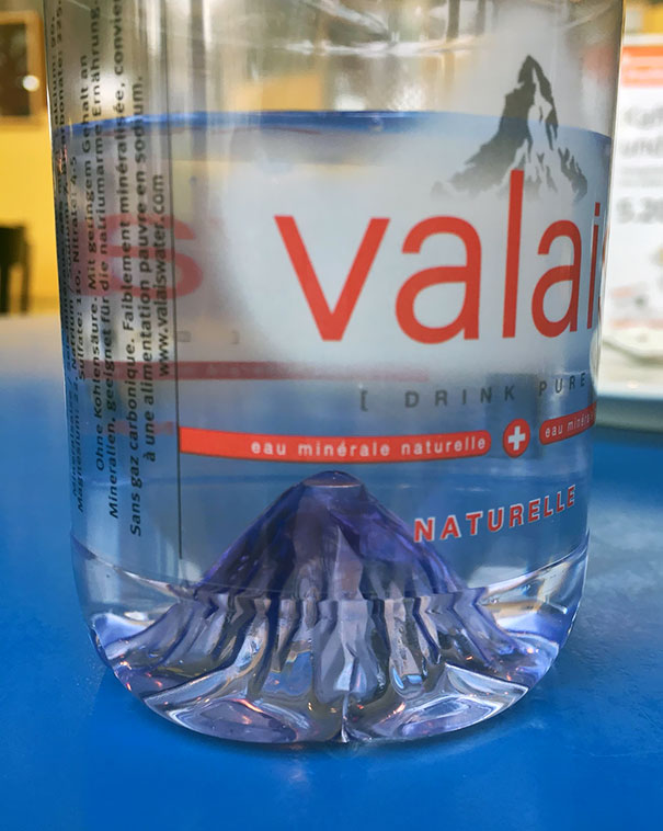 This Swiss Water Bottle Has A The Shape Of A Mountain Inside The Bottle