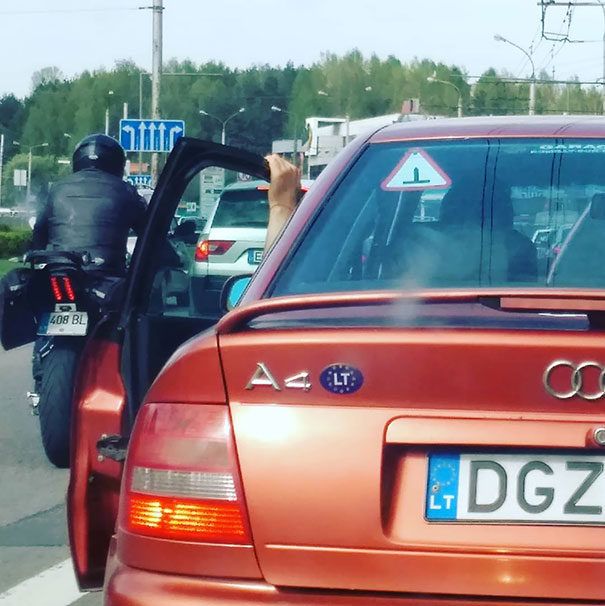 What Do You Do When It's Too Hot Outside? Turn On The Air Conditioner? Open The Window? No, You Go With Car's Doors Opened Because... YOLO