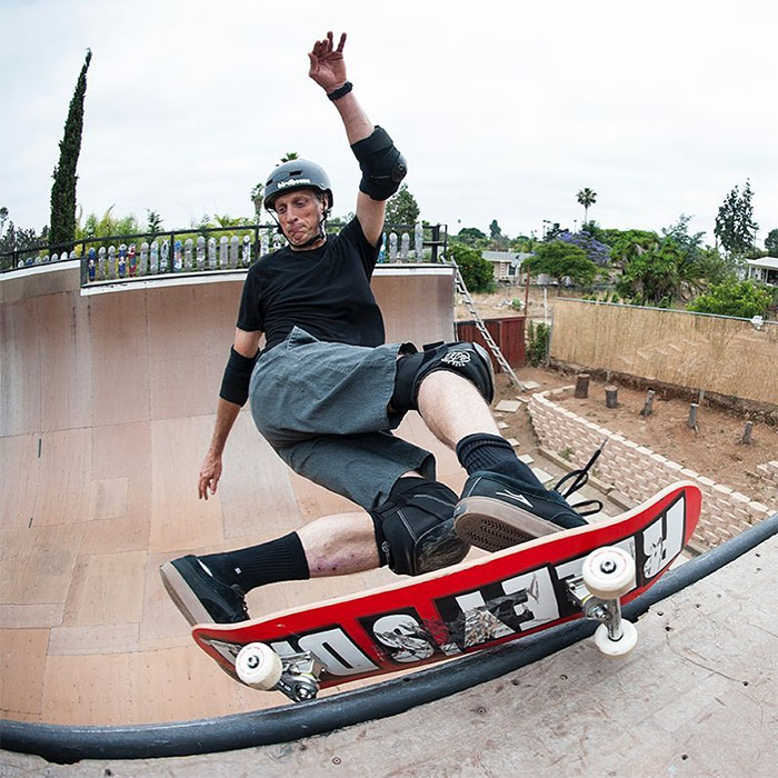 Tony Hawk performing tricks with his skateboard