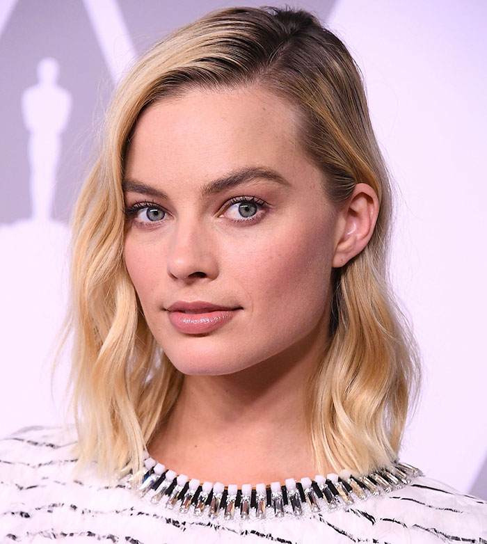 Margot Robbie close up looking